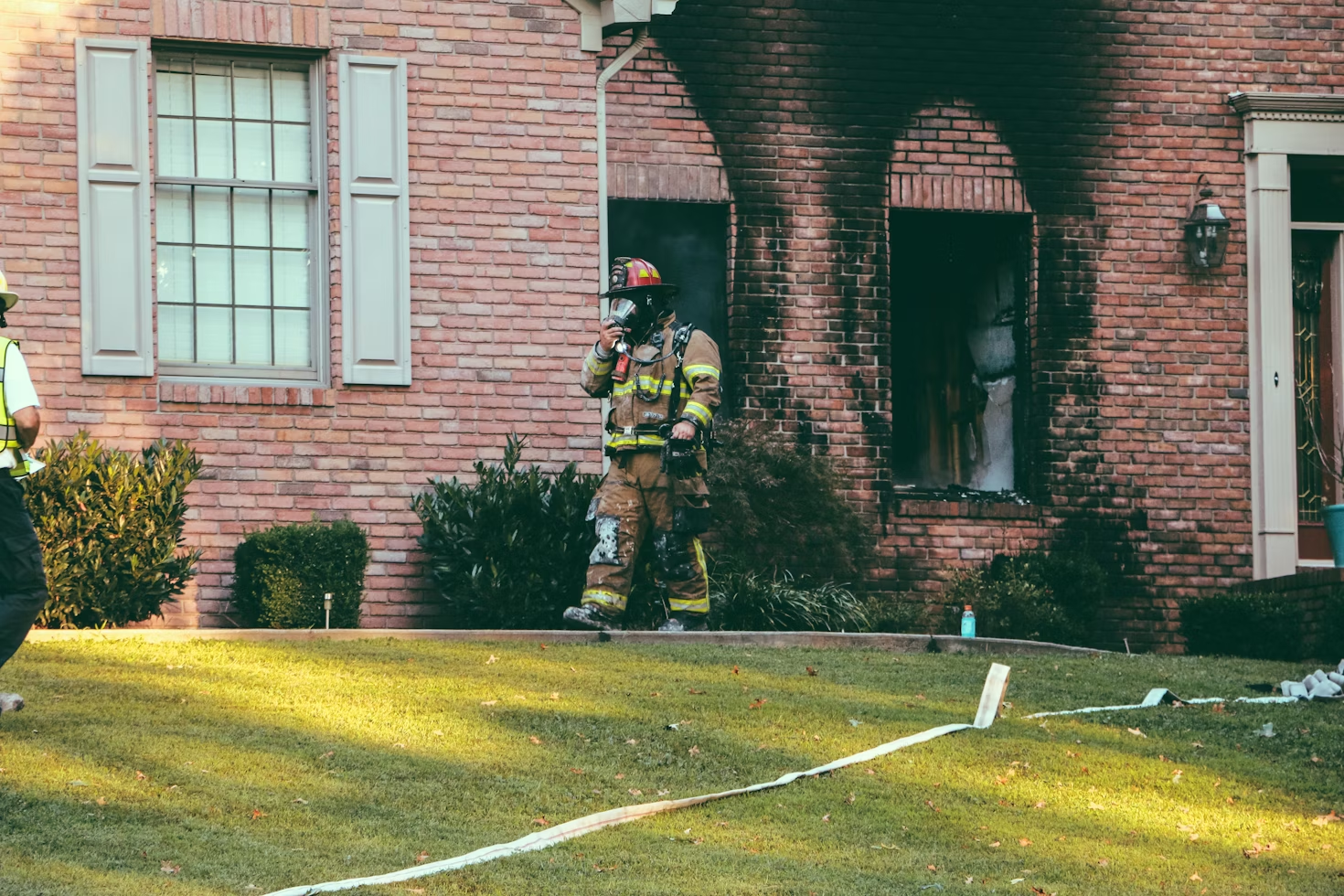 A smoke damaged brick home